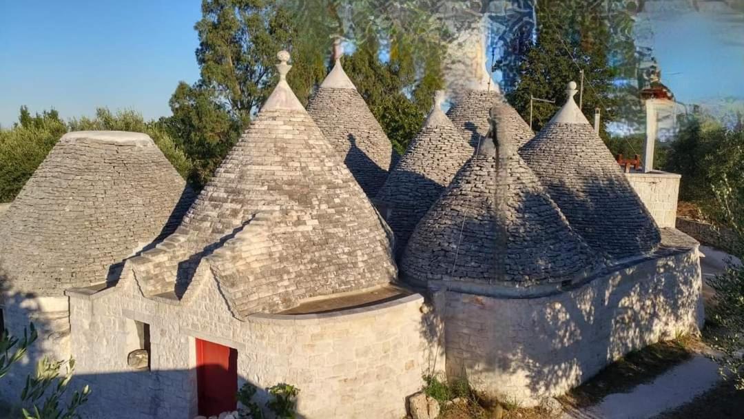 Trulli L'Utopia Di Anny Trulli Anny'S Utopia โลโกโรตอนโด ภายนอก รูปภาพ