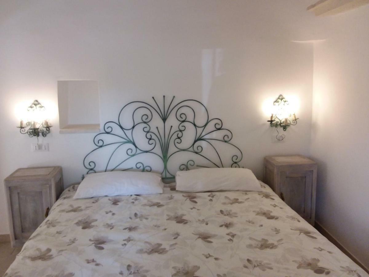 Trulli L'Utopia Di Anny Trulli Anny'S Utopia โลโกโรตอนโด ภายนอก รูปภาพ